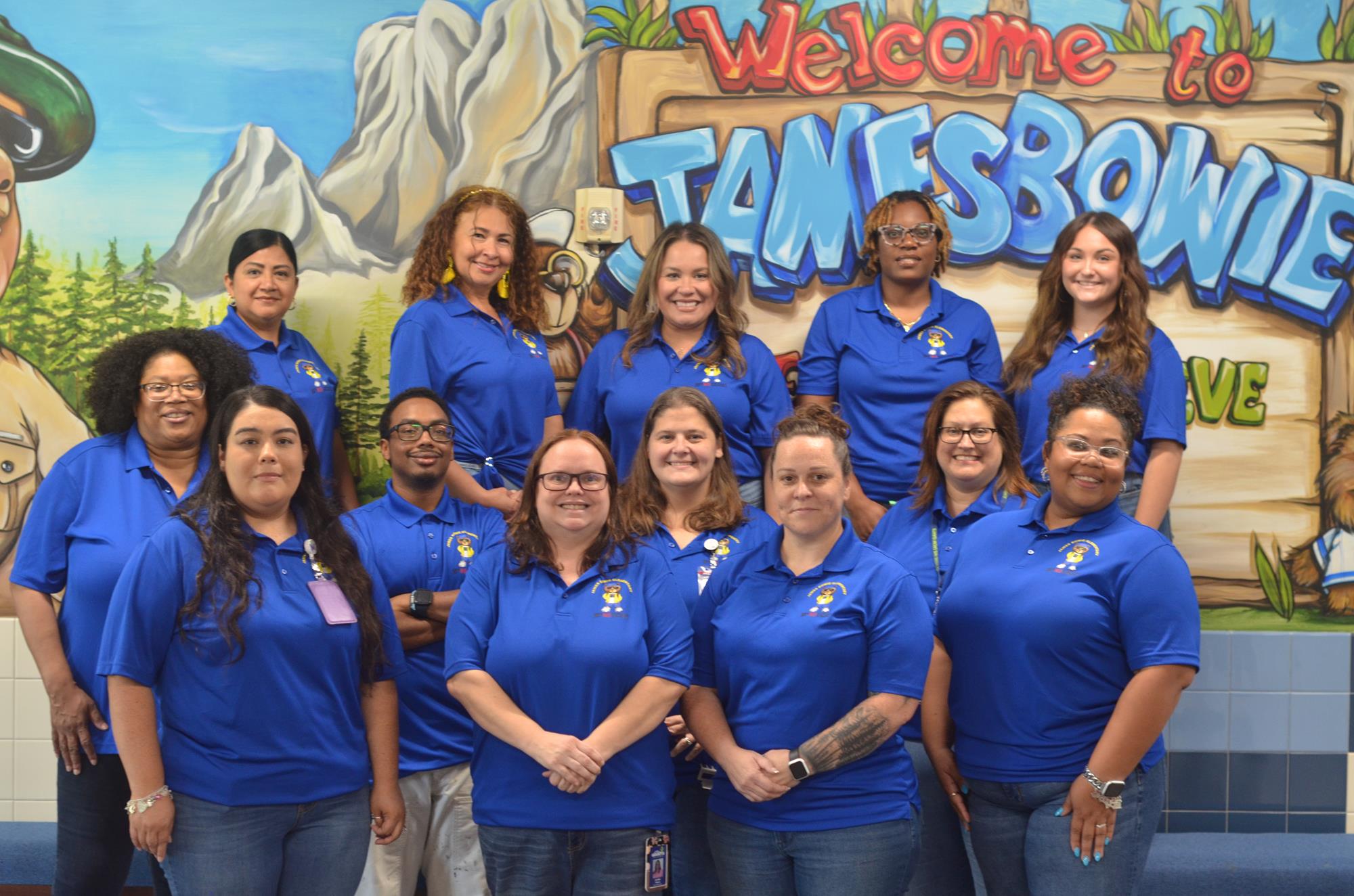 Special education staff smiling for staff picture